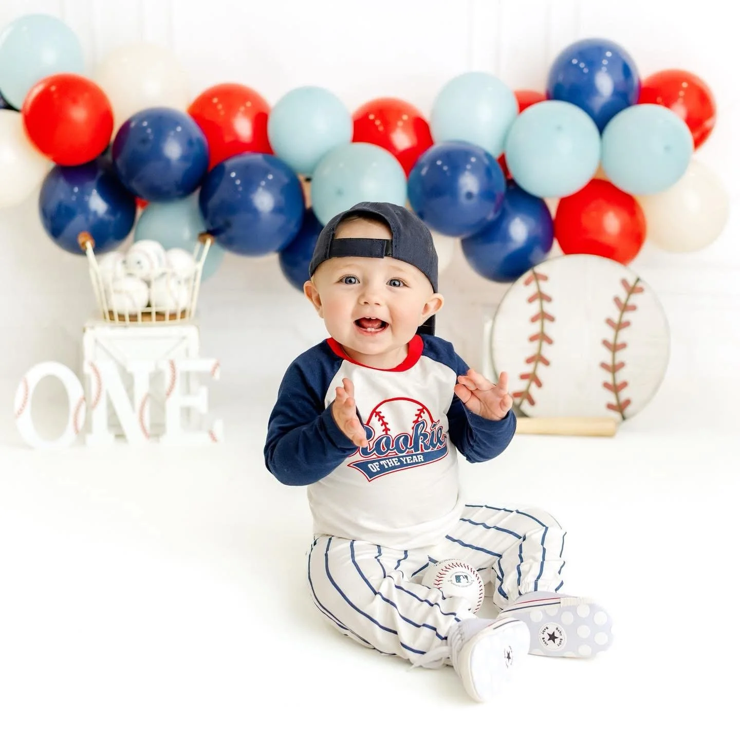 First birthday cake smash setup photographed in Syracuse, NY
