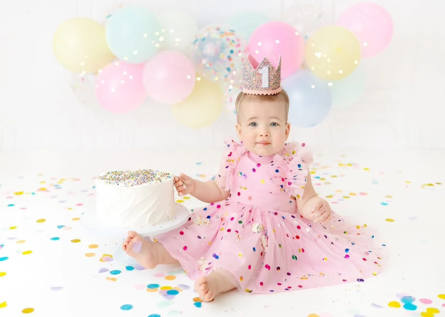 Milk bath portrait from a first birthday session