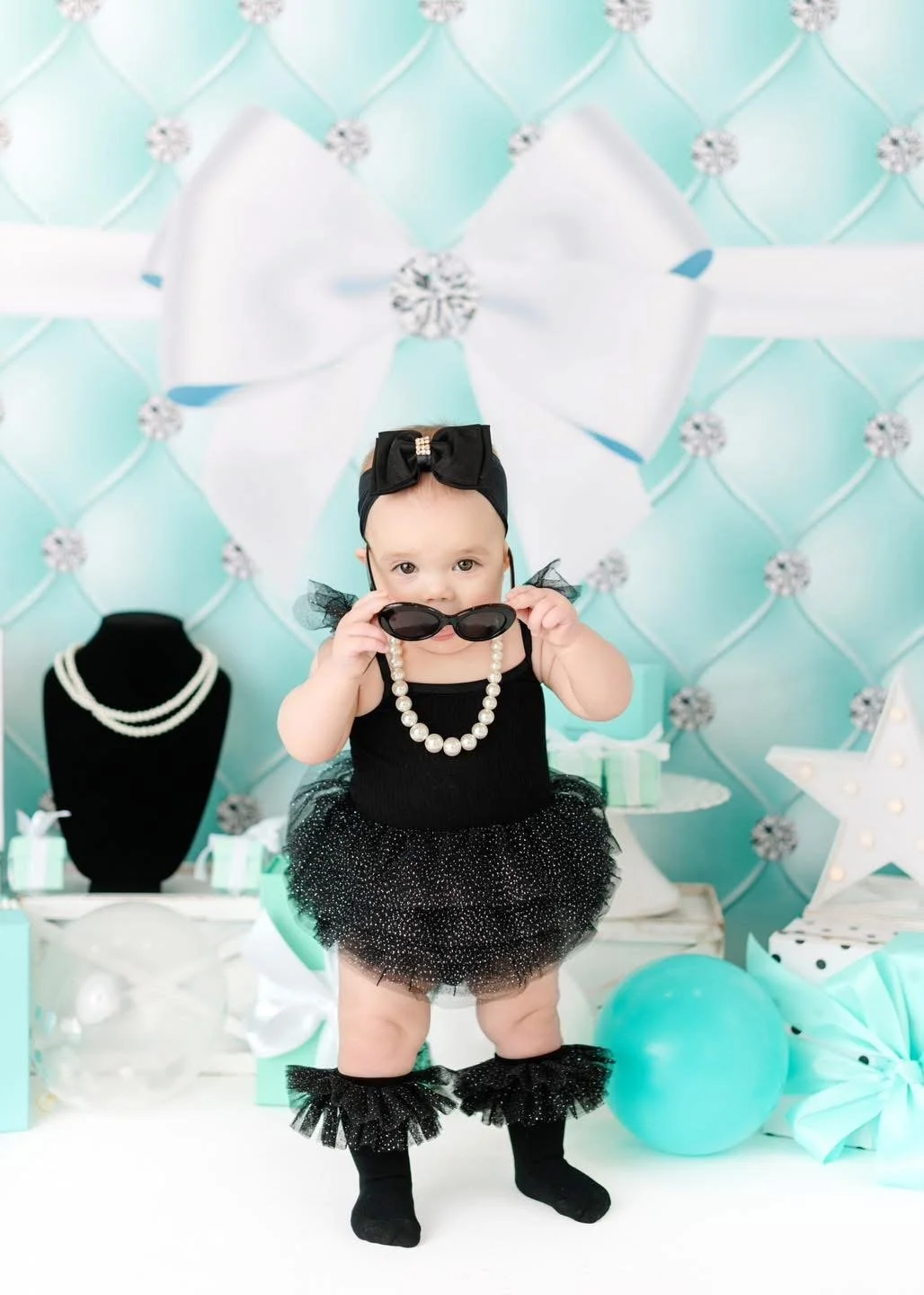 First birthday cake smash setup photographed in Syracuse, NY
