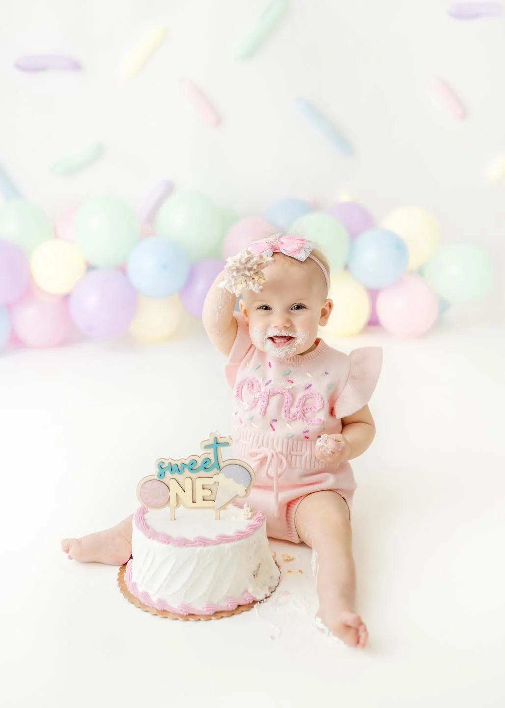 Milk bath portrait from a first birthday session