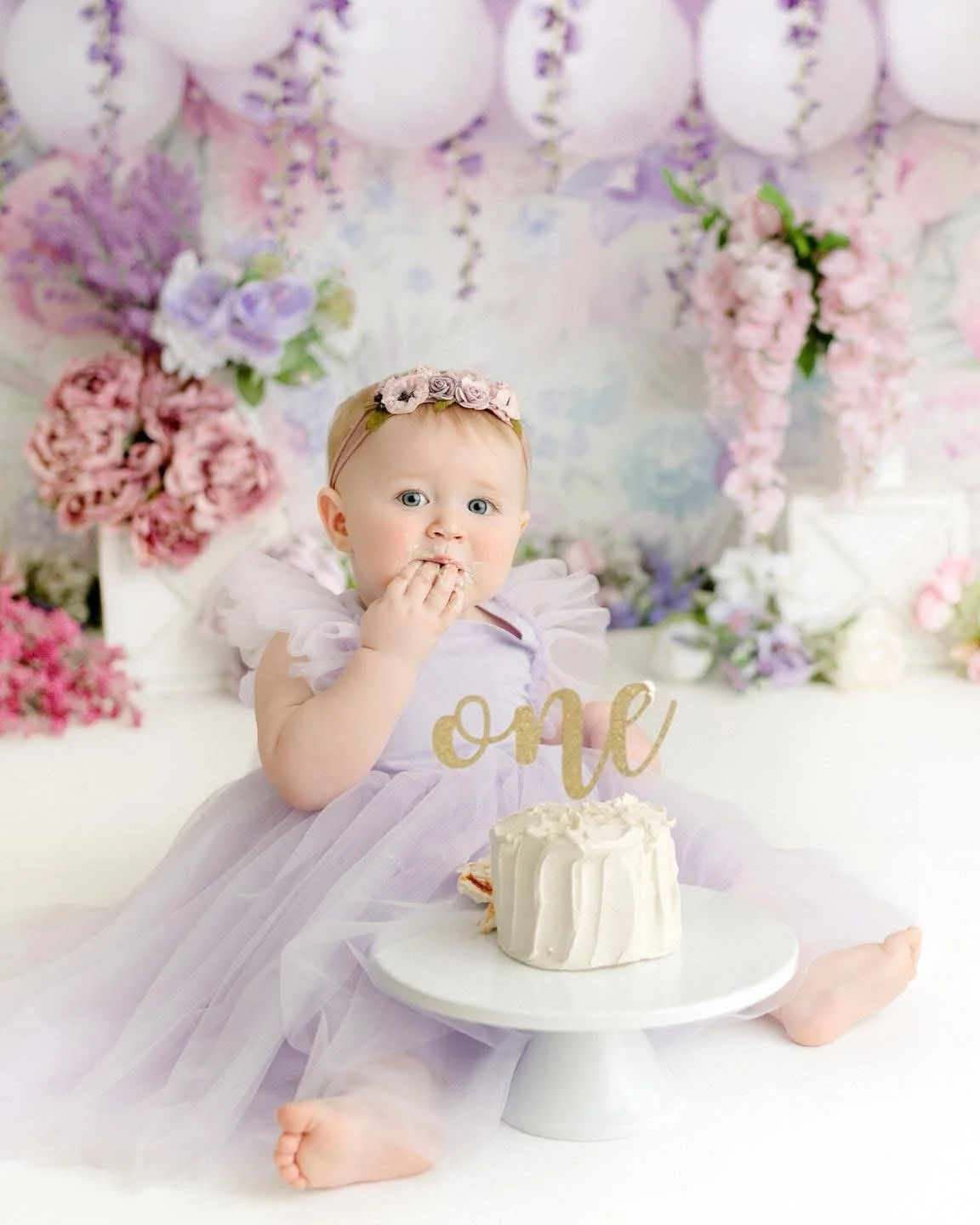 Milk bath portrait from a first birthday session