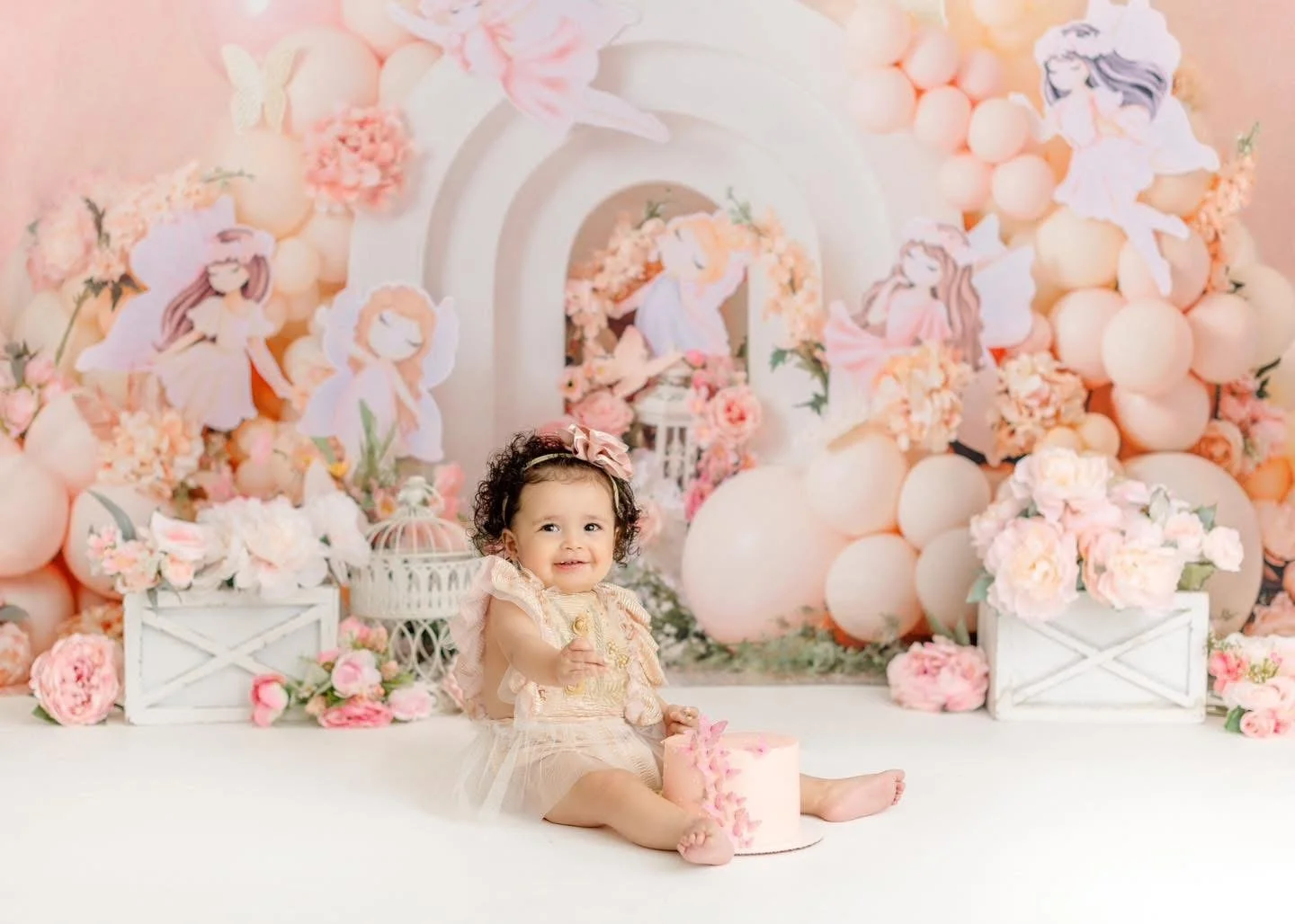 First birthday cake smash setup photographed in Syracuse, NY