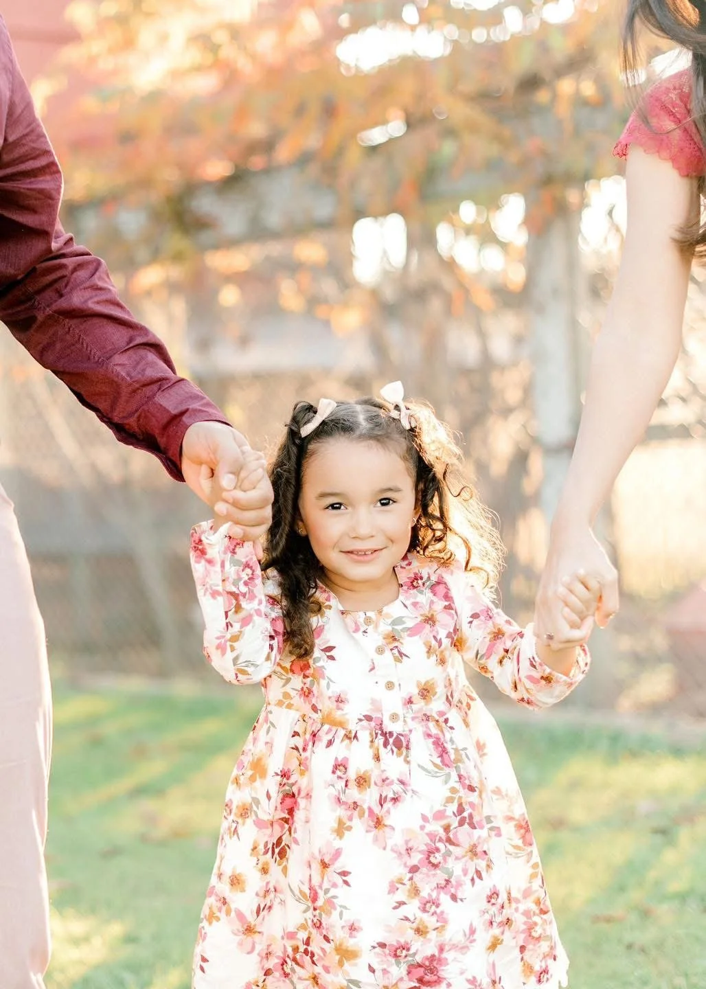 Mother and child photographed outdoors in natural light
