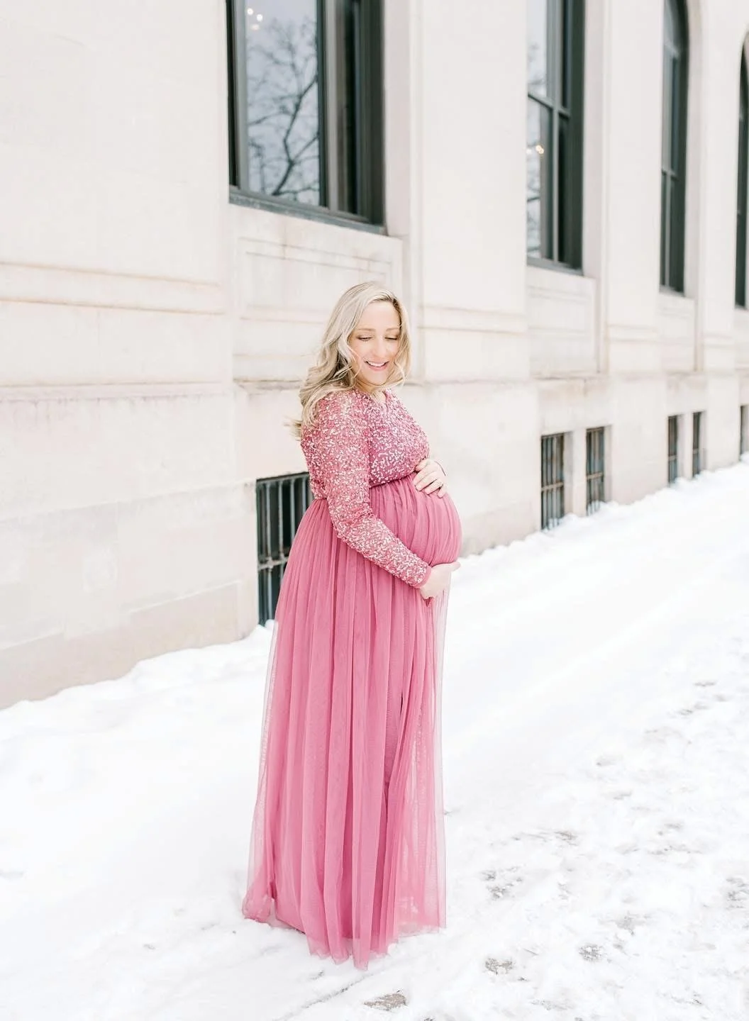 Expectant mother photographed in soft natural light in Syracuse, NY
