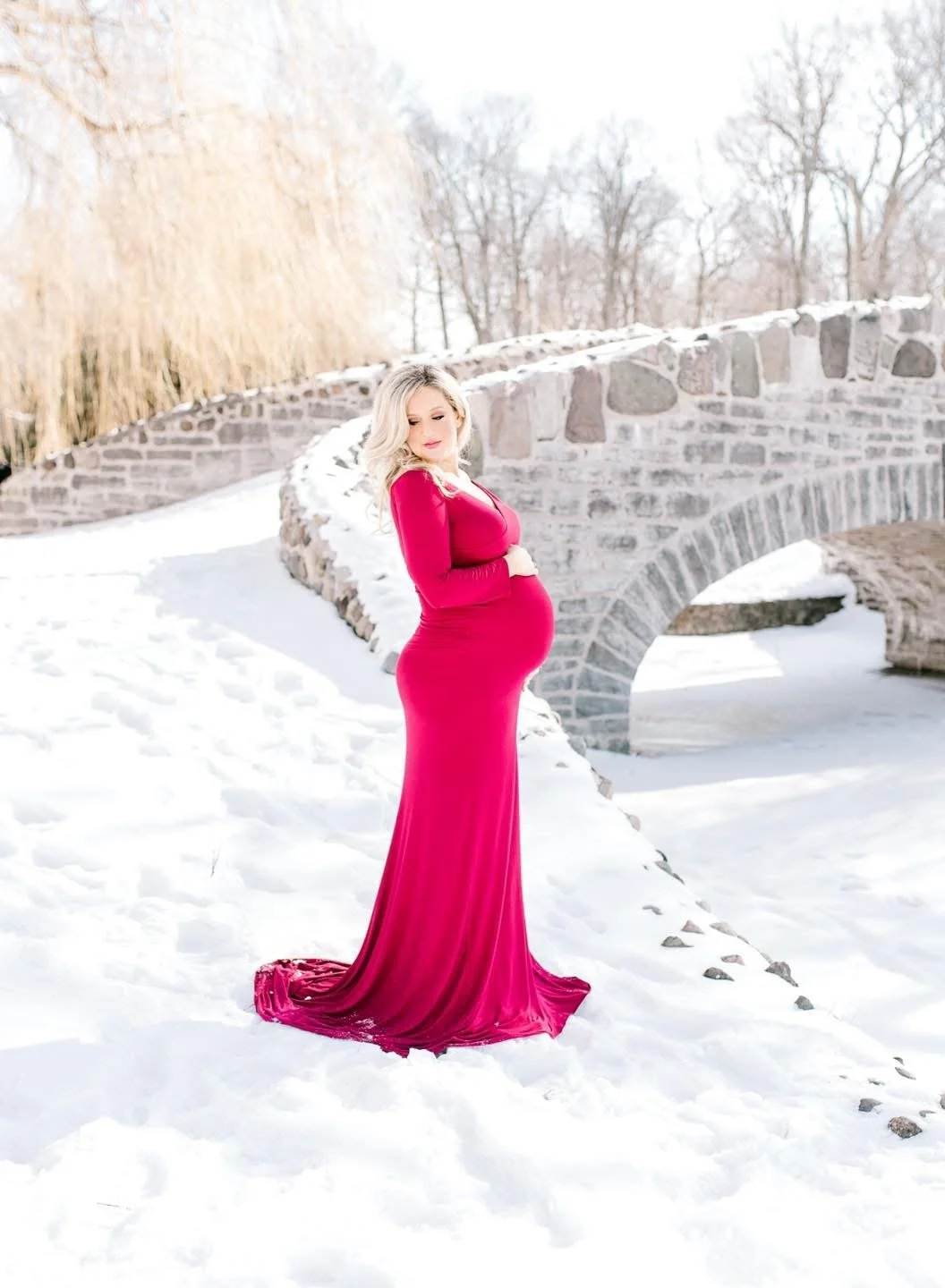 Expectant parents photographed together during a maternity session