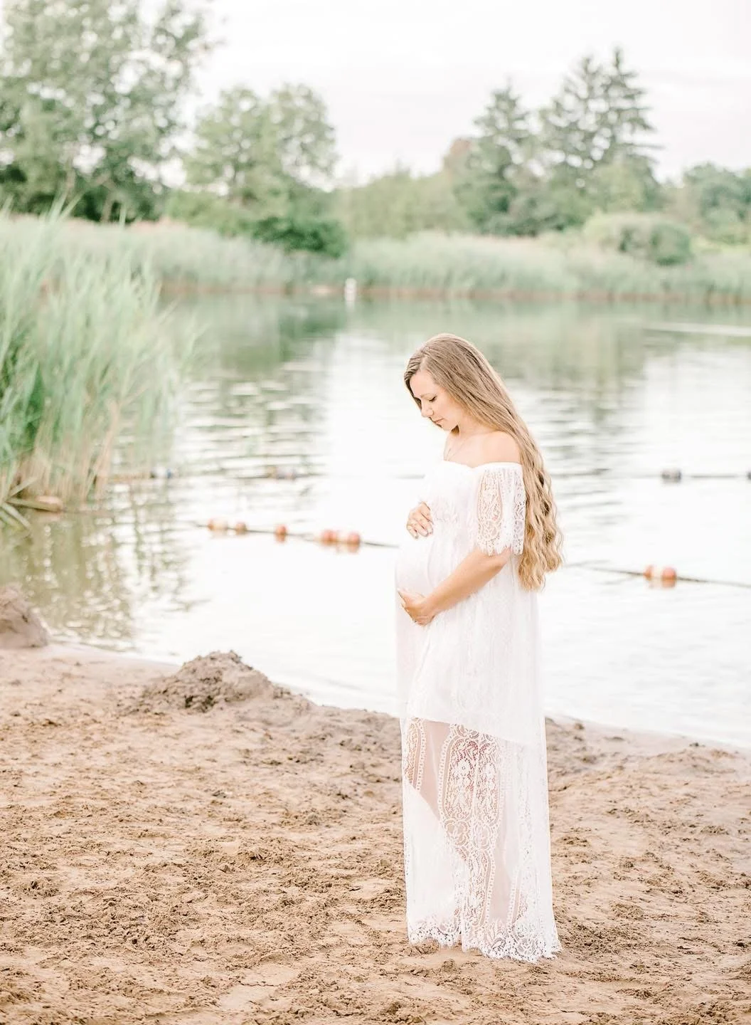 Expectant mother photographed in soft natural light in Syracuse, NY