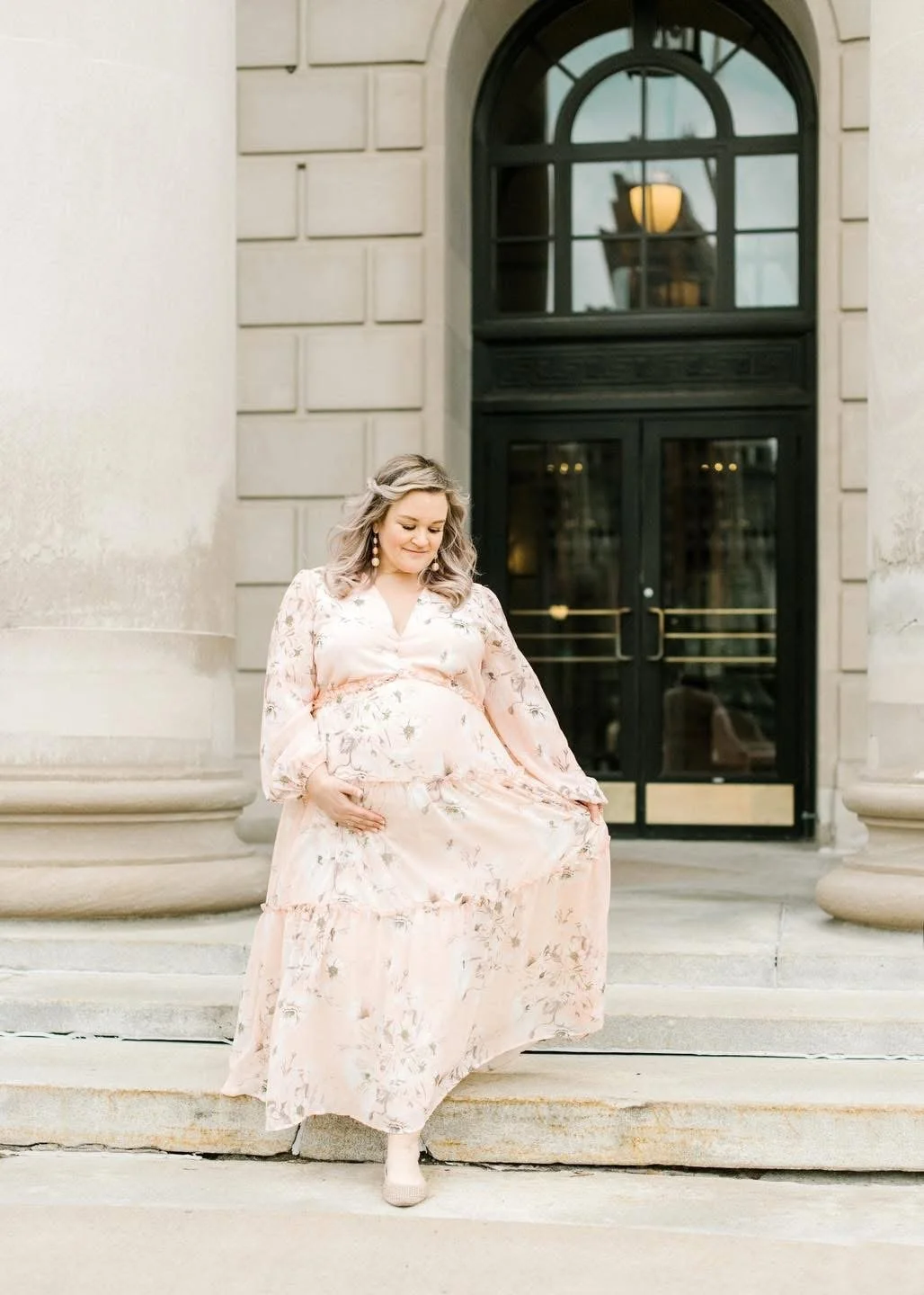Flowing gown maternity portrait from a Syracuse studio session