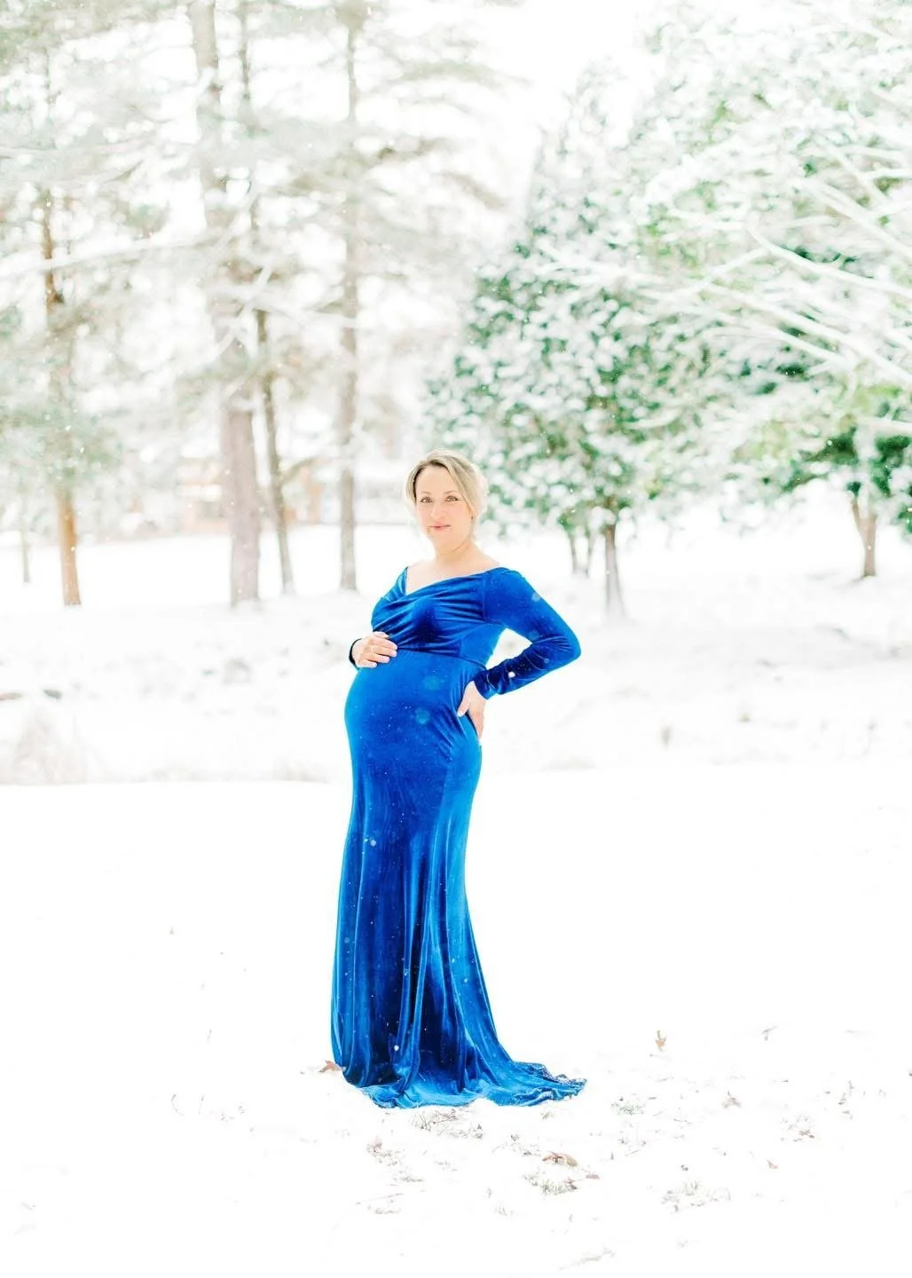 Expectant parents photographed together during a maternity session